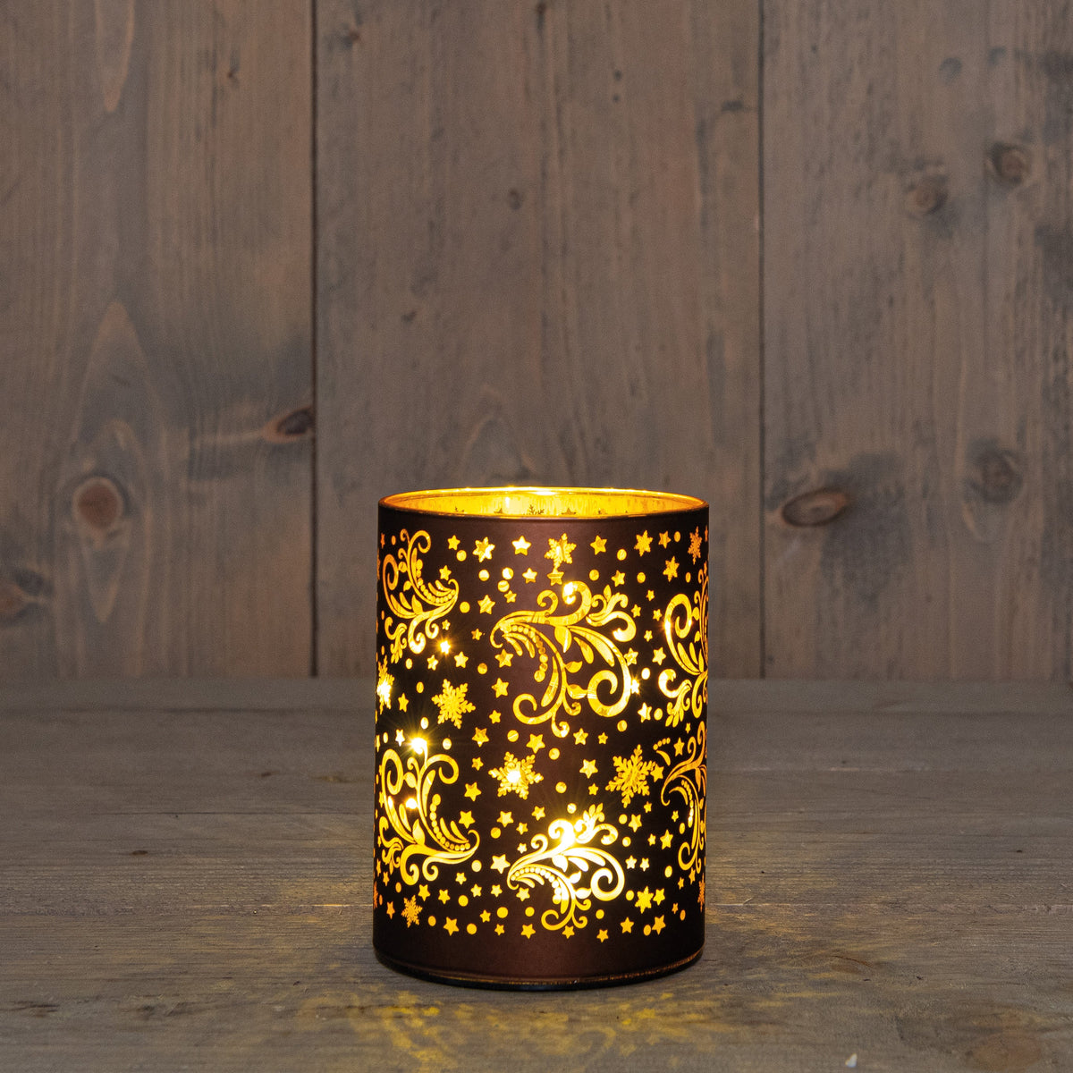 cylinder glas draaiend met sterren 10led warm wit op 3aa batterij met timer d9h16cm donkerbruin/goud