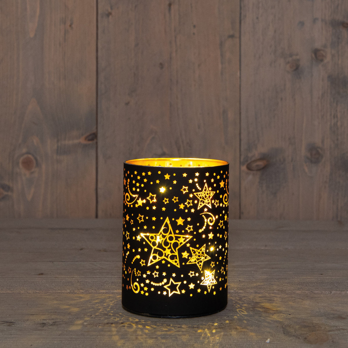cylinder glas met sterren 10led warm wit op 3aa batterij met timer 9h12cm zwart/goud