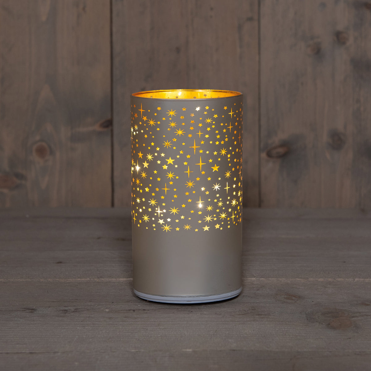 cylinder glas draaiend met sterren 10led warm wit op 3aa batterij met timer d9xh16cm champagne