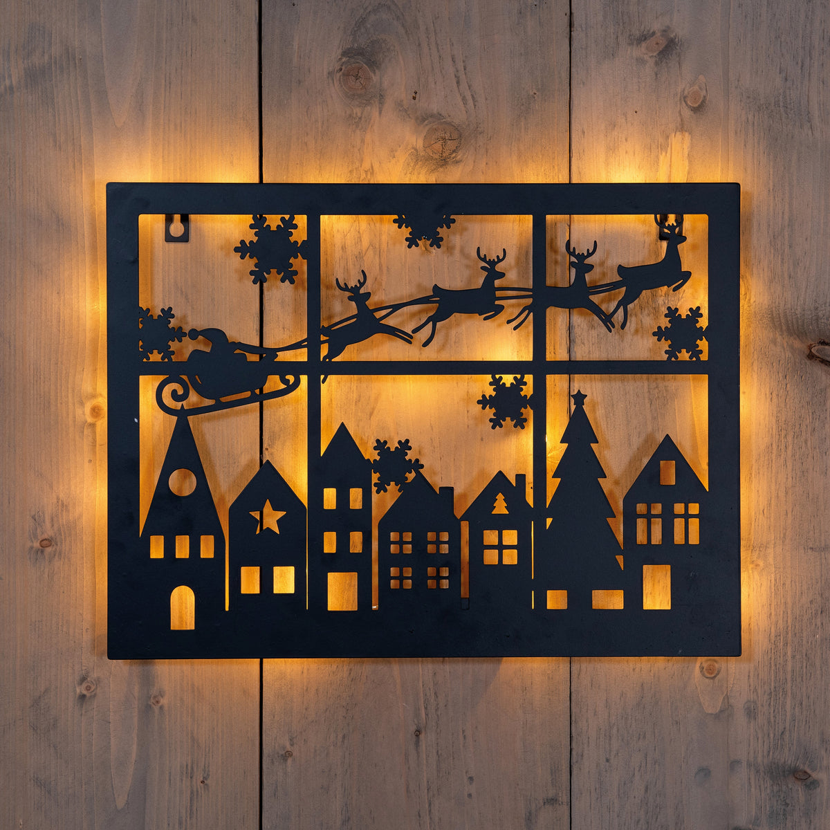 muurhanger met kerstman in slee/huisjes 27led classic op batterij met timer ip20 h32x40cm zwart