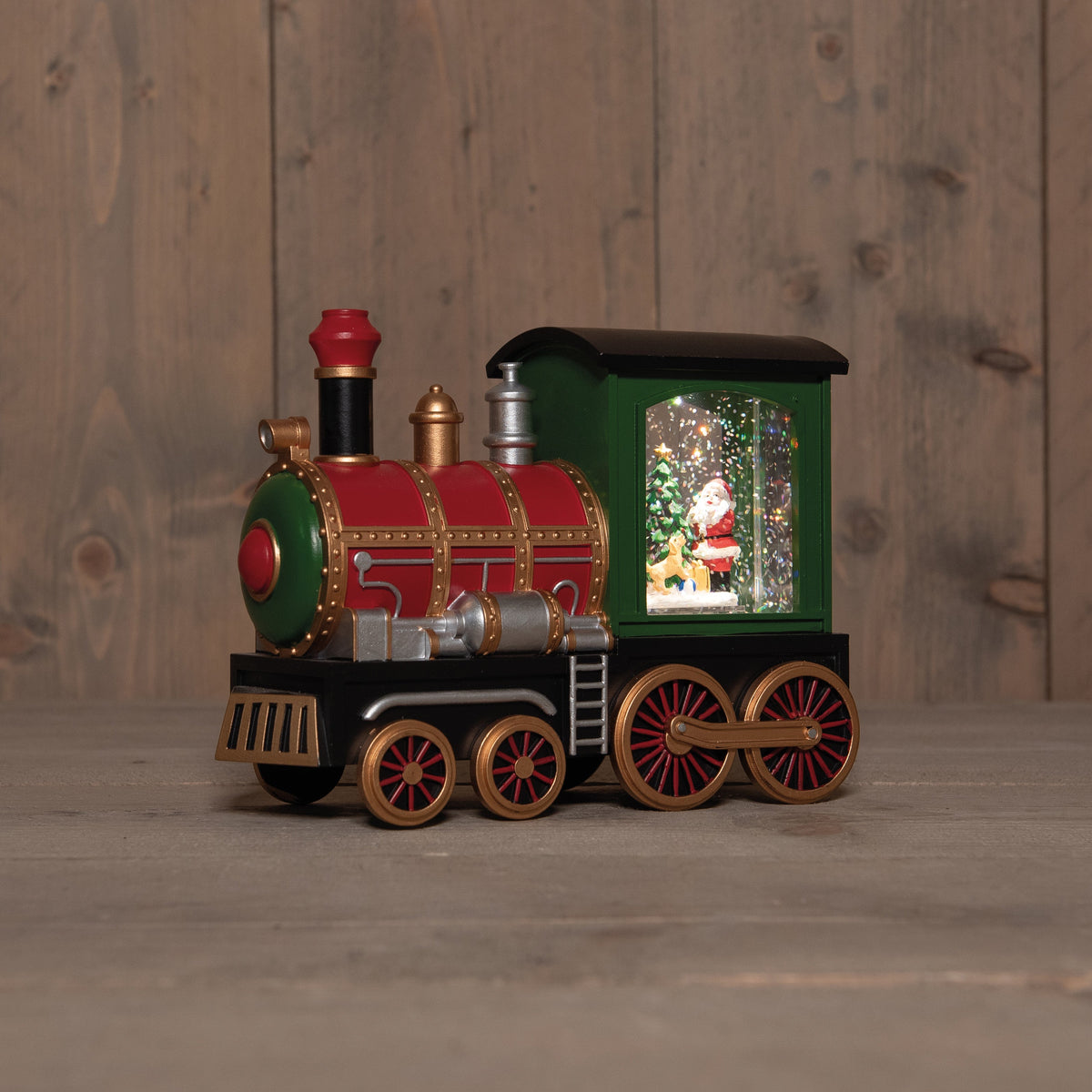 trein met santa in glitterwater op 3aa batterij met dc aansluiting 15x21cm warm wit