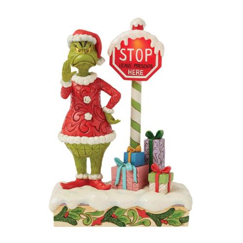 the grinch with flashing stop sign figurine