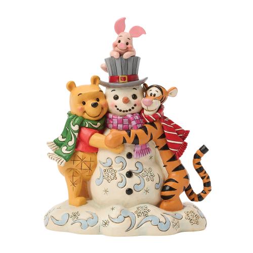 pooh and friends hugging snowman figurine disney traditions