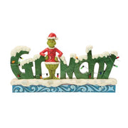 the grinch with 'grinchy' sign - the grinch by jim shore