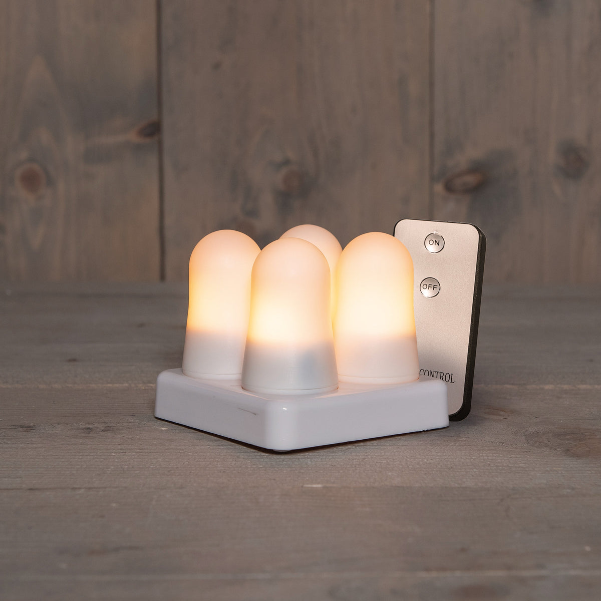 mini vlam oplaadbaar ip20 met afstandsbediening, oplaadstation en usb kabel dia3,8cm x h 6,3cm wit 4 stuks